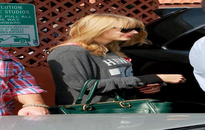 Taylor Swift's photo shoot for Vogue in London.  Taylor Swift's photo shoot for Vogue in London. ...