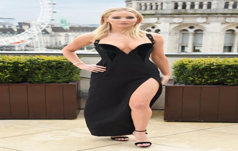 Jennifer Lawrence slams critics for wearing a gorgeous versace gown called racist.  Jennifer Lawrence slams critics for wearing a gorgeous versace gown called racist.